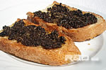 Black truffles on toast or bruschettas with truffles