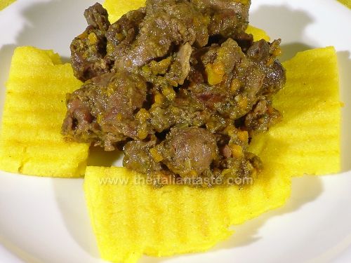 Venison stew on grilled polenta slices