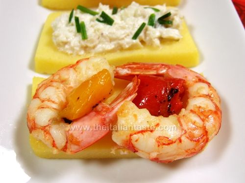Polenta slices with king prawns