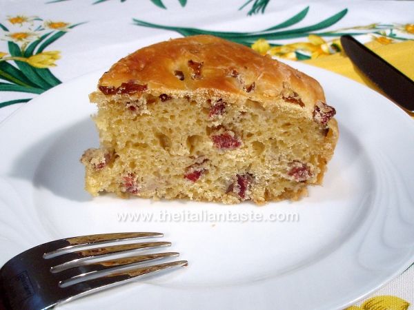 Savory cake with bacon and mushrooms in oil